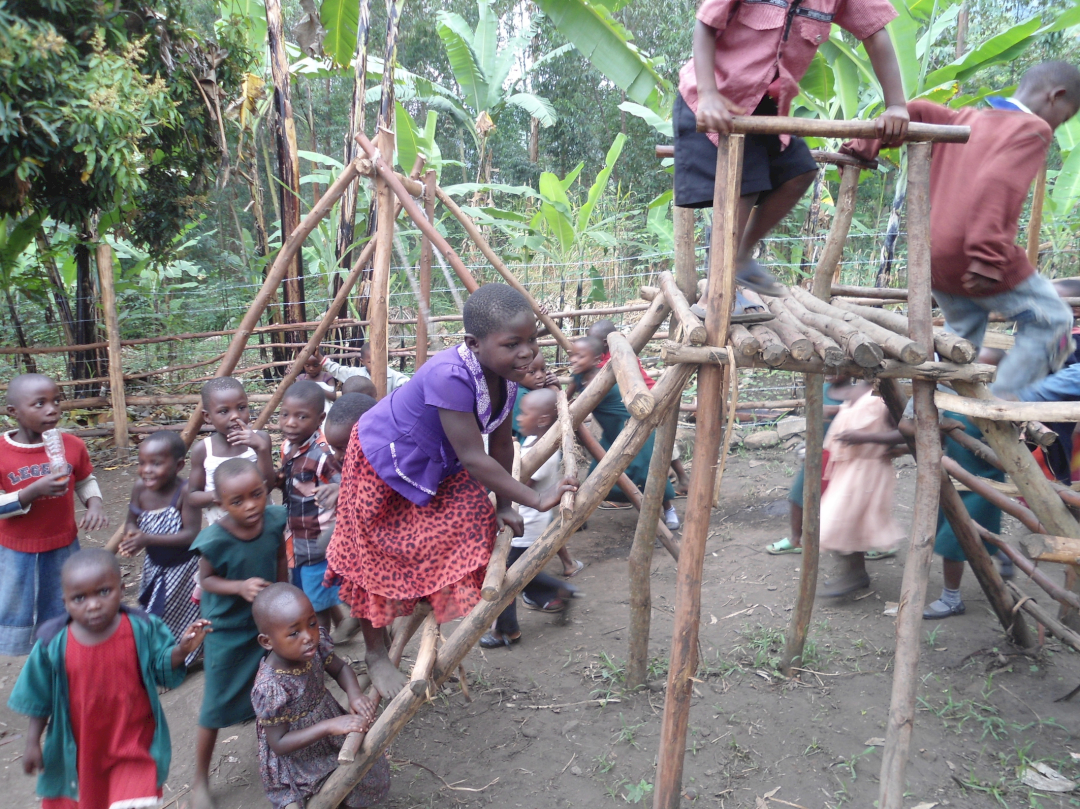 Children on homemade play equipment